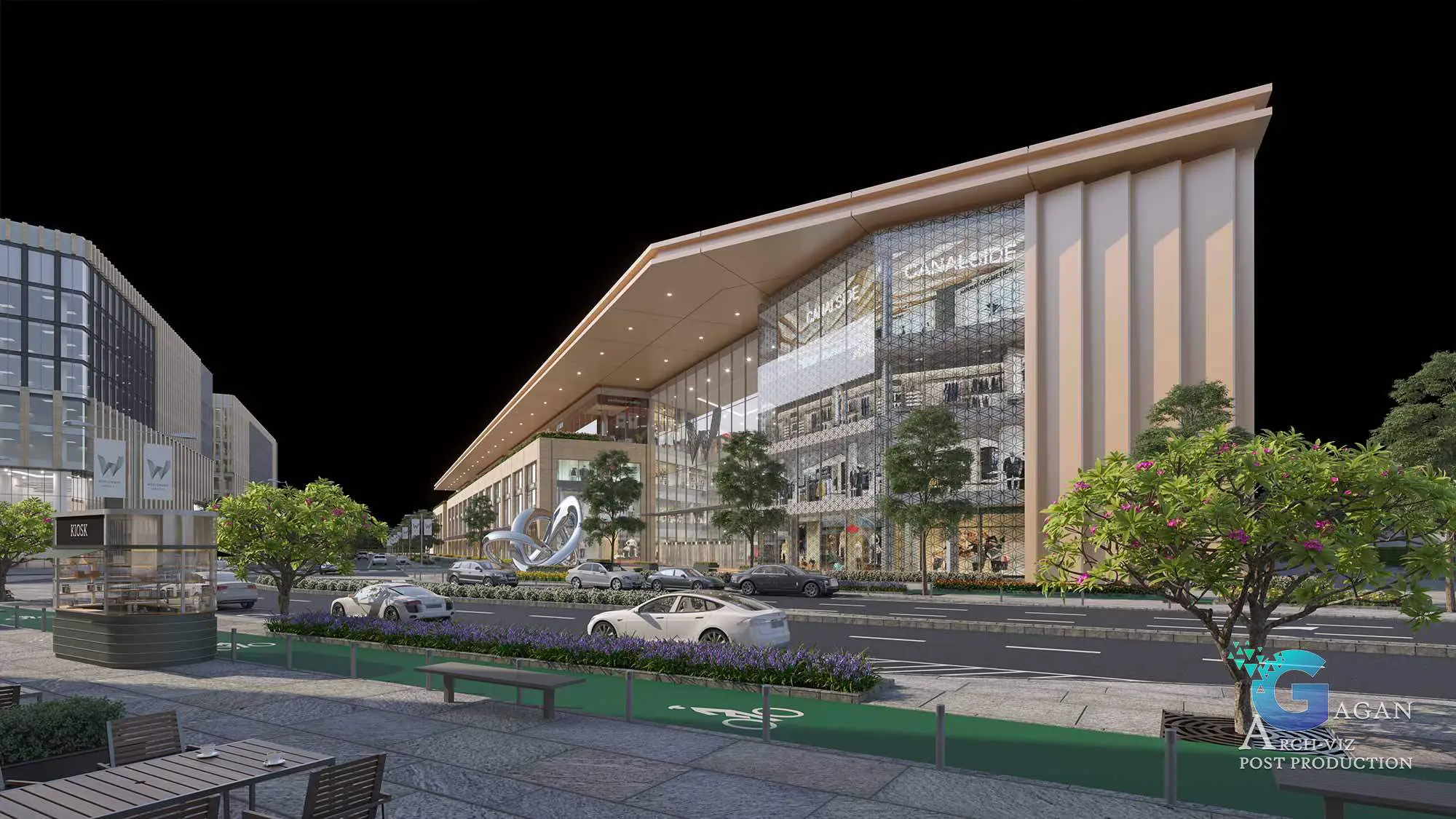 "Photorealistic 3D rendering of a modern commercial complex named 'Canalside,' featuring angular rooflines and extensive glass facades. The foreground includes artistic elements, such as a sculpture near the entrance and an outdoor seating area with tables and chairs. The landscaped sidewalk is lined with trees and plants, while parked cars add realism to the urban street scene. Post-production techniques emphasize realistic textures, balanced lighting effects, and vibrant color grading, creating a polished and professional architectural visualization