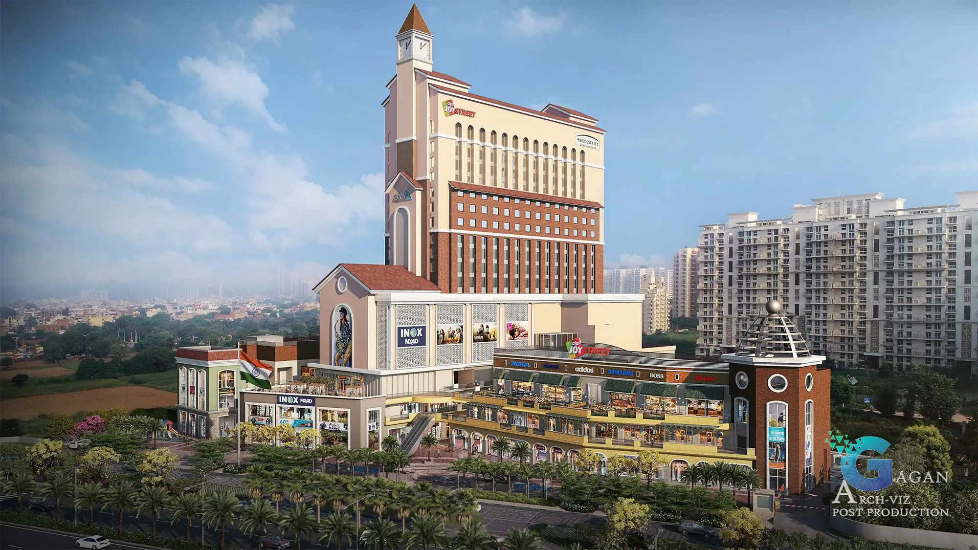 Photorealistic 3D rendering of a shopping and entertainment complex named 'Joy Street,' featuring a multi-story design with modern and classical architectural elements. The facade showcases retail brands like Adidas, Puma, and Levi's, alongside an INOX cinema. Upper floors include office or hotel spaces under the 'Joy Street' signage. Post-production highlights include enhanced lighting for realism, vivid color grading for the landscaped greenery with palm trees, and reflective textures on glass windows, creating a professional and polished visual